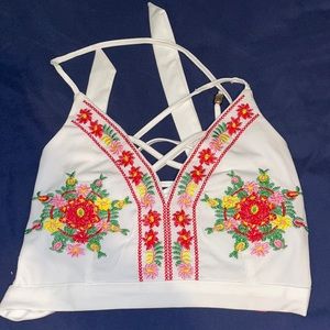 LUXMI Brand Super cute white tank with color flowers in the front.